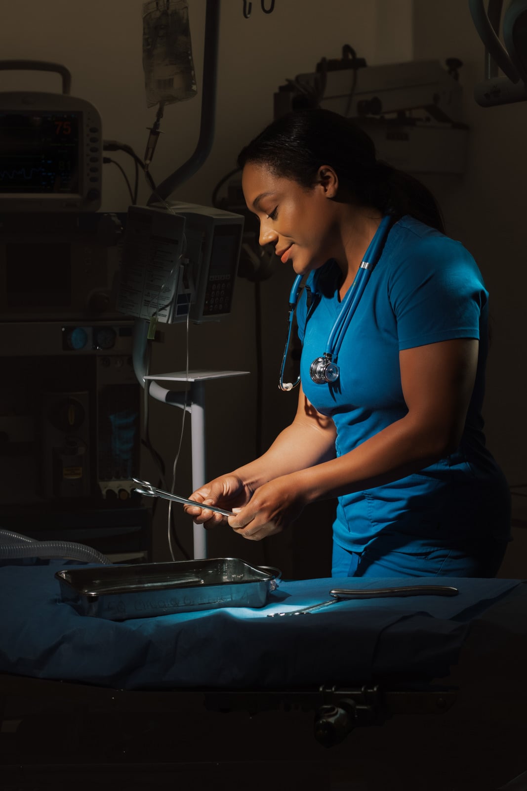 A clinician preparing an operating theatre