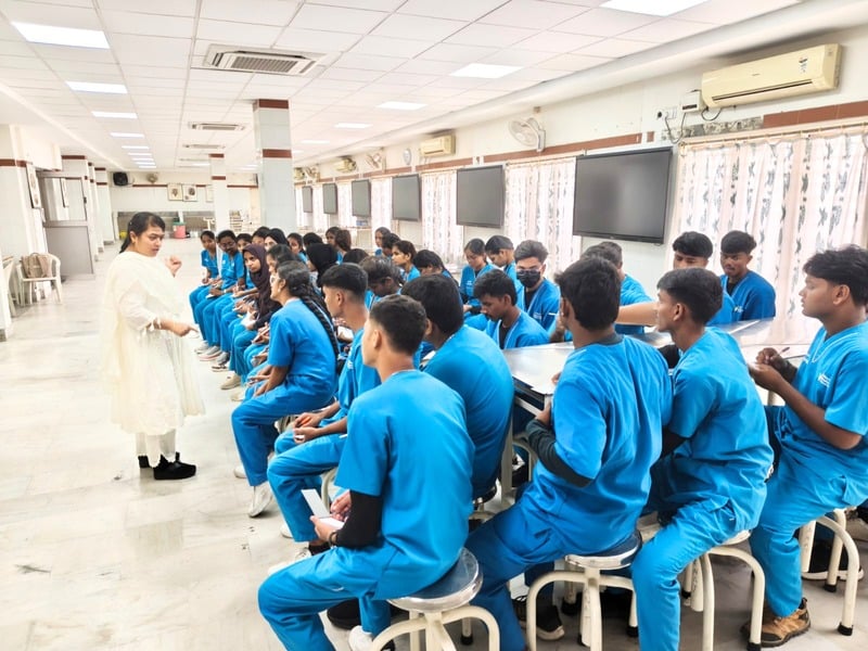 Healthcare students preparing together in class